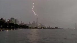 Lightning strikes One World Trade Center building as Hurricane Henri approaches
