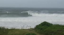 Massive waves from Tropical Storm Henri pound Massachusetts coast