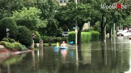 'Man Kayaks in Flooded Street Following Heavy Rain in Worcester '