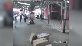 Woman falls under moving train, saved by security forces in eastern India