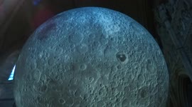 Blue moon mysteriously glowing for visitors of St John the Baptist Church as Museum of the Moon travels around Kensington