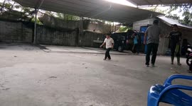 A Kid Perform Kungfung While Waiting His Mom in A Car Wash Station