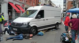 Exctinction Rebellion activists lock themselves to van in central London blocking traffic