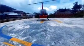 Helicopter transports volunteers to remote mountain region in China to deliver COVID-19 tests