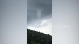 Twin waterspouts form near coastal town in the Philippines