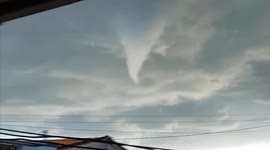 Watch moment tornado forms above panicked villagers in southern Vietnam