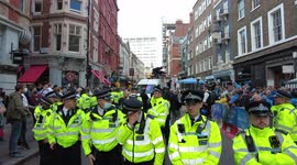 Police arrest protester who had been protesting on top of a van at the Extinction Rebellion Impossible Rebellion protest in London