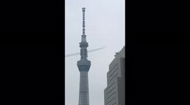 Japan Air Self Defense Force Blue Impulse Jets Fly Across Tokyo Sky Tree before Paralympic Opening Ceremony