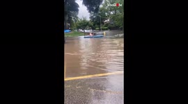Man kayaks through flooded Massachusetts streets after storm