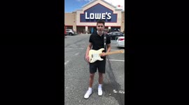 Prankster guitarist plays 'Home Depot' tune at rival store 'Lowe's'