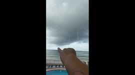 Stunning waterspouts swirl off coast of Florida