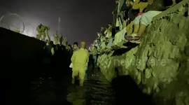 Desperate Afghans wade through SEWAGE to reach Kabul airport