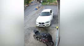 Trailer comes loose and smashes into parked car