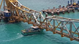 Fishing boat clipped by bridge somehow avoids injury and catastrophe in southern India