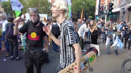 Extinction Rebellion boogie with a hula hooper dancer while blocking the road in Central London