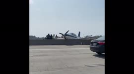 Plane crashes on San Diego freeway, hits cars, injures people and causes major traffic jam