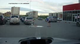 Shopper attempts to ride trolley but ends up flipping cart and smashing groceries