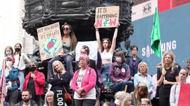 Speech given during Extinction Rebellion Protests Day 3 - protestors holding placards at Piccadilly Circus