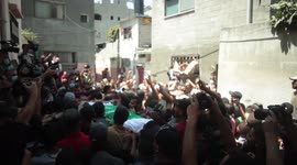 Palestinians mourn the body of Osama Duaij, who was shot dead by the Israeli army on the Gaza border