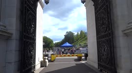 The Marble Arch Mound visitor entrance busy with tourists on a sunny day