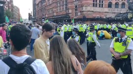 Police tell pedestrians they will be arrested during 'Extinction Rebellion' protest in London, UK