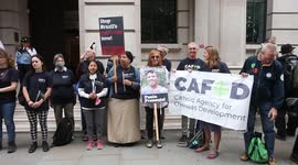 CAFOD - Catholic Agency for Overseas Development show solidarity with Extinction Rebellion on Brazilian genocide at Brazilian Embassy in London