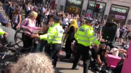 Police violence against extinction rebellion women In Oxford Circus