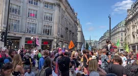 Extinction Rebellion protesters block Oxford Circus, London, UK 25 August 2021