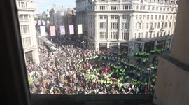 Police cordon formed in Oxford Circus around Extinction Rebellion protestors obstructing public place