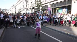 Oxford Circus blocked by Extinction Rebellion protestors - drummers and dancers occupy major streets