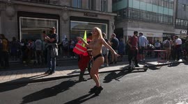 Naked women dancing during Extinction Rebellion protests day 3 in Oxford Circus, London