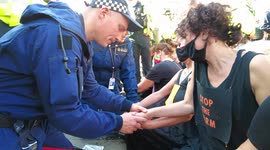 Police use de-bonding agent to release superglued Extinction Rebellion activists