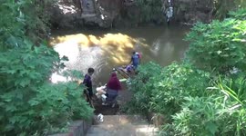 across the river on a banana tree raft