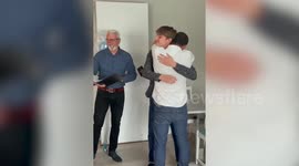 UK dad breaks down in tears after wife and 18-year-old step-son surprise him with 'adoption' ceremony on his birthday