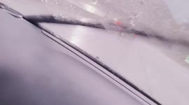 Woman films MASSIVE BOLT of LIGHTNING striking a pole while in car near Parleys Canyon'