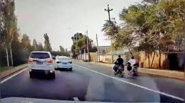 Shocking video appears to show motorist driving into rider who fell off his bike