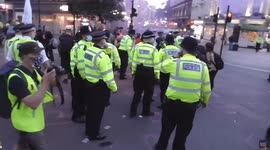 drummer with blond dreadlocks arrested. extinction rebellion demonstration.