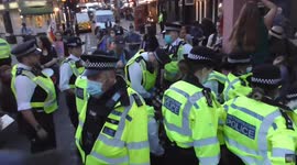 men carried out by police Extinction rebellion  obstruction of the highway.