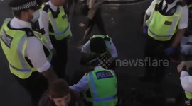 two women carried out by police Extinction rebellion  obstruction of the highway