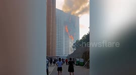 These scenes of a massive fire engulfing a 28-storey apartment building in China are terrifying