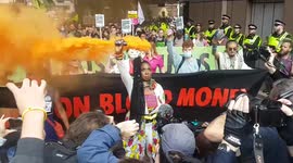 Extinction Rebellion move through the City of London in fifth day of protest in Blood Money March