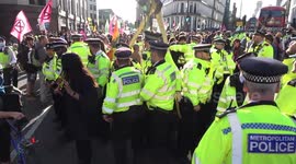 Police swoop in on Extinction Rebellion protesters who assemble structures at Mansion House