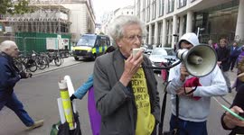 Piers Corbyn rants moments after an altercation with Extinction Rebellion protesters during their Blood Money March