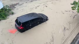 Car washed away by severe flash flood in Thailand