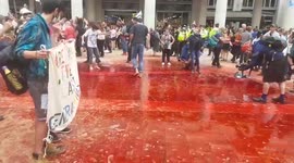 Extinction Rebellion covers London's financial district in fake blood