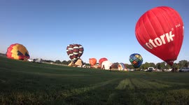 Time-lapse of colorful hot air balloons from all over the world, take off from Yorkshire racecourse