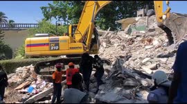 Rescuers keep digging through rubble in Haiti two weeks after deadly earthquake