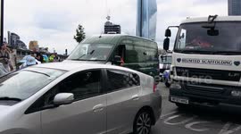 Desperate drivers honk car horns in attempt to drown out Animal Rebellion protesters who blocked streets