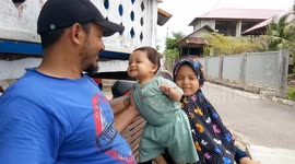Cute Father Handle His Baby While His Wife Studying Islamic
