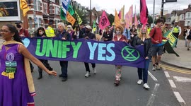 Extinction Rebellion and XR Unify supporters march from Ducketts Common to the